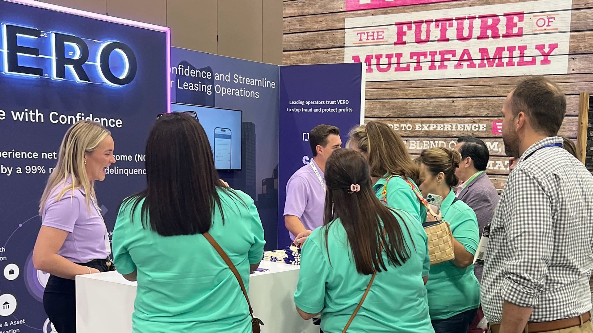 Image of Apartmentalize 2025 attendees visiting the VERO booth