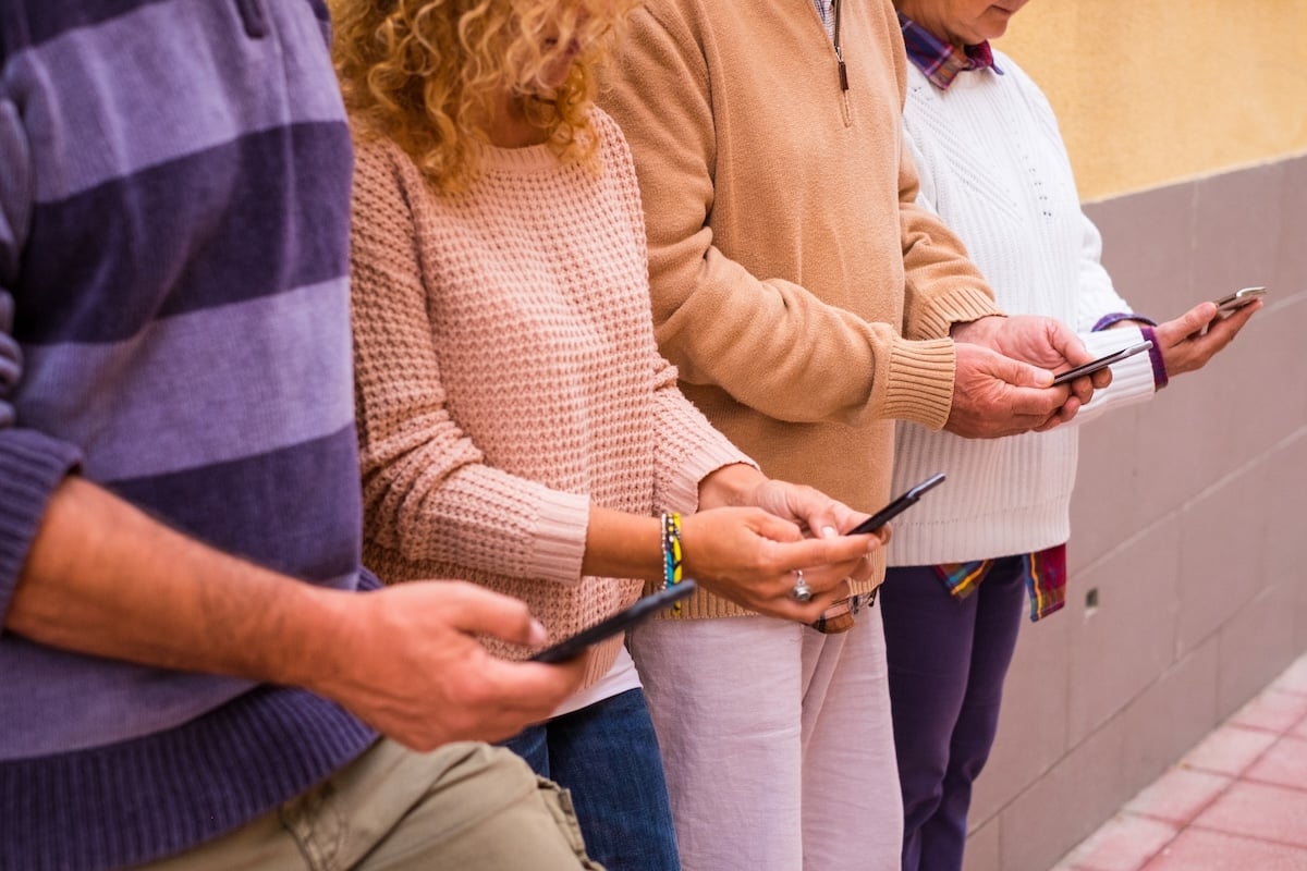 close-up-and-portrait-of-four-people-using-their-p-2025-03-09-22-12-48-utc