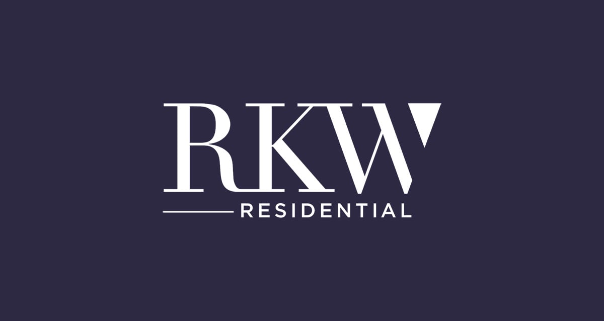 Image of a white RKW Residential logo on a purple background