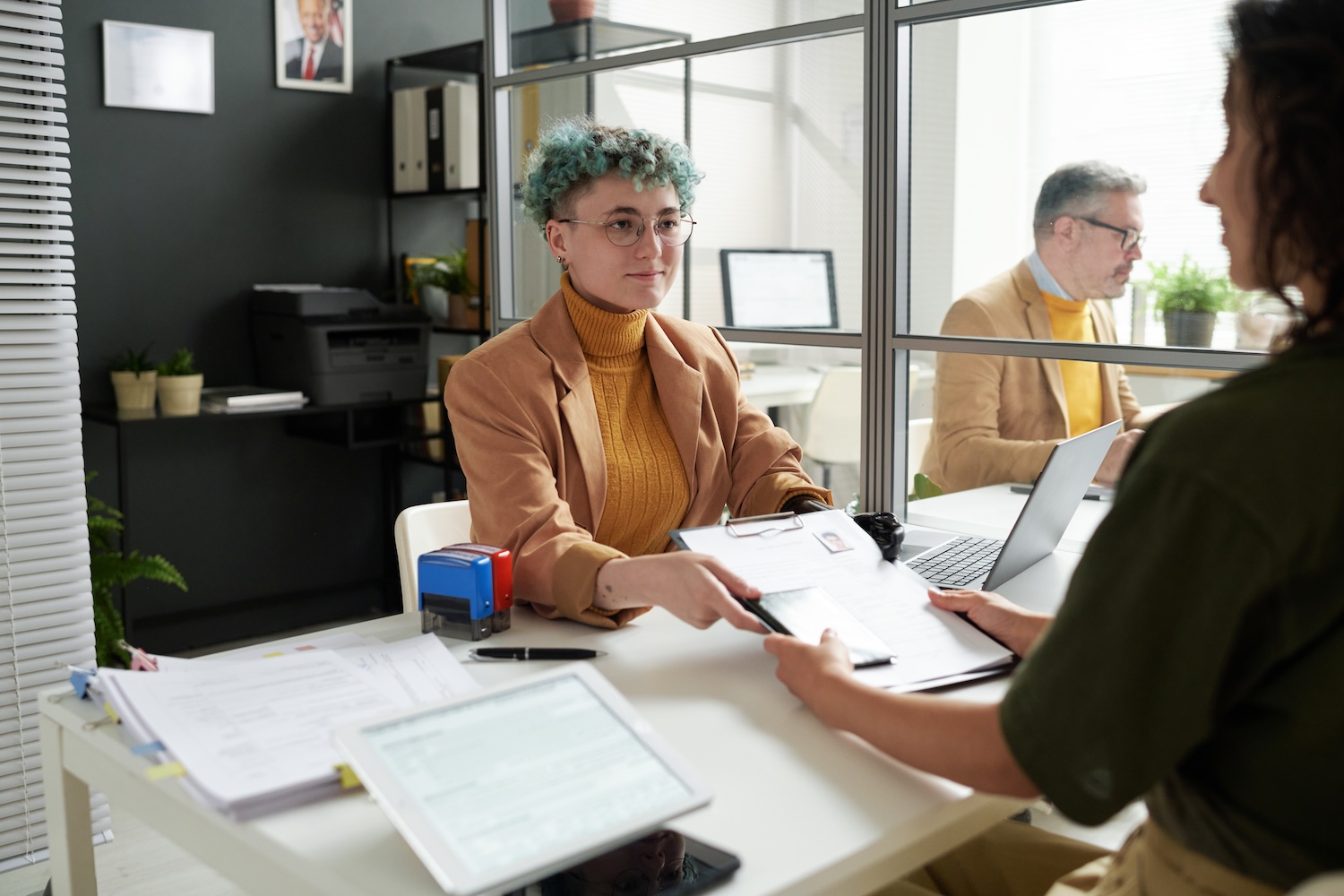 Image of multifamily leasing manager manually screening tenant application